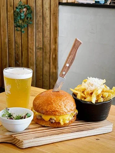 brunch lisboa burger with cheese fries and fresh juice